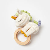 Handmade unicorn baby rattle with pastel yarn and wooden teething ring